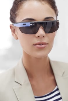 Virtual reality, portrait and woman with smart glasses for technology, internet or protection from sun. Metaverse, bokeh and face of female person for sunglasses, innovation and user experience.