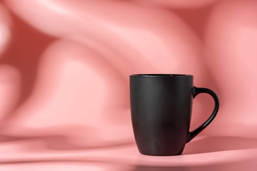 Ceramic mug mock up on pink background studio shot