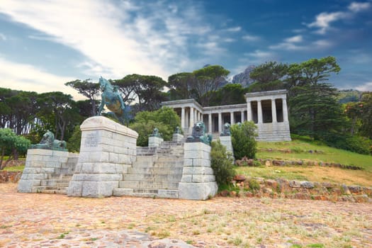 Rhodes Memorial, monument and architecture in Cape Town, outdoor and design for historic building. Tourism, landmark or statue of famous politician, sculpture or art work on mountain in South Africa