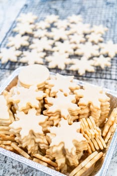 Baking Snowflake-Shaped Sugar Cookies for Homemade Christmas Gifts