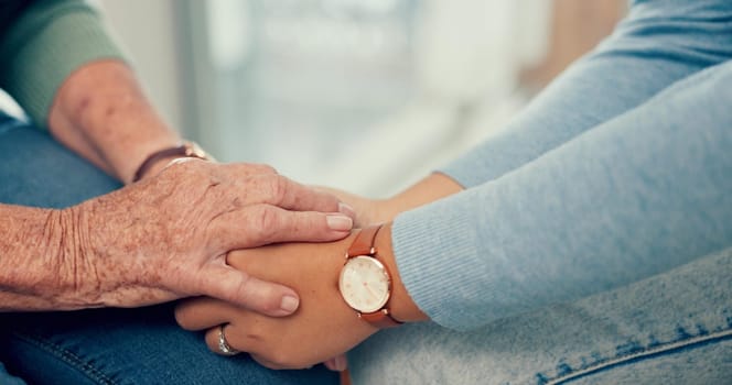 Comfort, senior or closeup of people holding hands for comfort or heal for wellness together. Therapist, sympathy or elderly person bonding, praying or care after death with psychologist or support