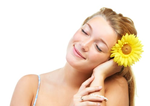 Skincare, smile and happy woman in studio with sunflower in her hair for natural cosmetics on white background, Flower, face or female model with wellness, glowing skin or organic beauty treatment.