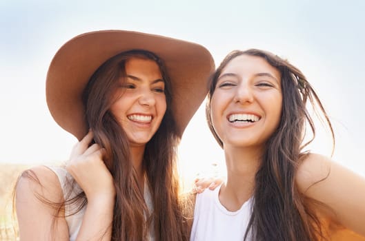 Women, selfie and outdoor in summer hat for travel, holiday and happy vacation in sunshine together. Excited and young people or friends by countryside for fashion and profile picture with cool style.