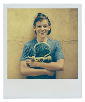 Portrait, skateboard and happy teenager on a wall background for sports, polaroid or fashion picture in Australia. Cap, skater and smile of young boy with a hat for instant photograph on mockup space.