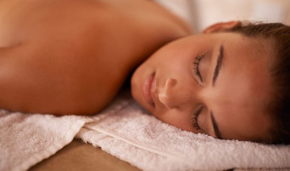 Wellness, calm and woman in spa for peace or vitality with wellbeing, luxury and pamper for body care or treatment. Female person, resort and carefree after massage therapy for stress relief to relax.