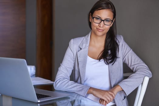 Portrait and laptop for businesswoman in office, and desk for professional person. Face, happy and technology for attorney lawyer in workplace, eyewear and computer for legal research for case.