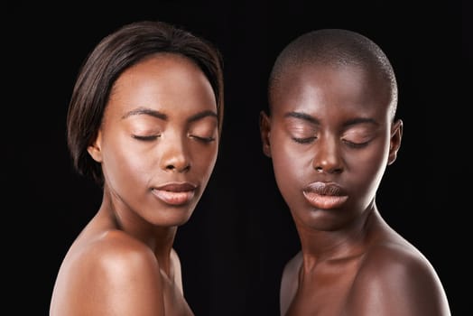 Studio, skin care and wellness of friends, cosmetics and foundation on black background. Sisterhood, African women and together for dermatology or facial treatment, confidence and proud of glow