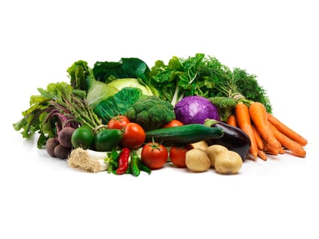 Groceries, harvest and vegetables in studio for nutrition, agriculture or healthy diet. Fresh food, ingredients and organic produce on white background for wellness, vegan lifestyle or sustainability