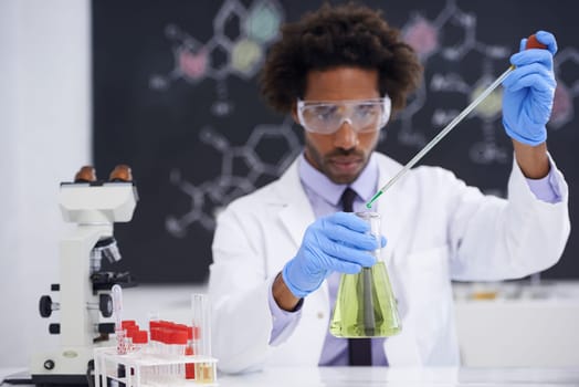 Science, test and man with solution in glass, chemistry and medical research for results with lab technician. Biotech, laboratory and scientist with liquid sample for analysis, investigation or exam