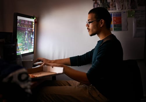 Night, gamer or man with computer, tech or typing with esports or programmer with nerd or geek. Person, home or guy with pc or online competition with dark room or rpg player with network or internet