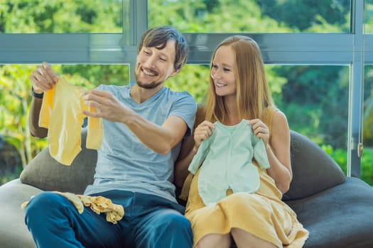In a heartwarming scene, the future mom and dad hold their unborn baby's clothes in their hands, savoring the joy of anticipation and shared excitement for their little one's arrival