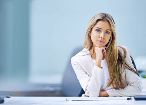 Corporate, portrait and businesswoman at desk in office for accounting company, financial advisor or employee. Consultant, professional and female person for worker, staff or confidence in workplace