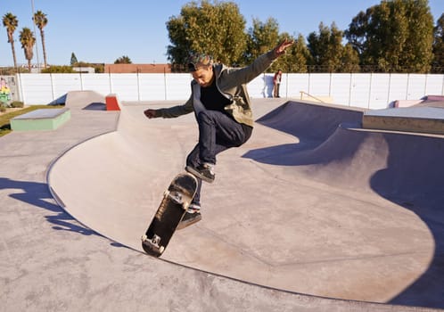 Skateboard, park and man with ramp, fitness and training for a competition and skating style. Adventure, person and skater with practice for technique and performance with exercise, energy or cardio