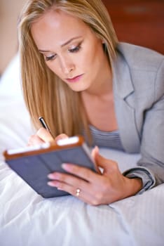 Business, woman and tablet on bed with planning for corporate research, digital technology and work schedule. Professional, person and touchscreen for writing review notes or internet search in home