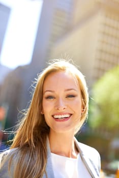 Smile, urban and portrait of businesswoman, city and professional for corporate employee. Confidence, happy and commute or travel to workplace in New York, business consultant and successful career