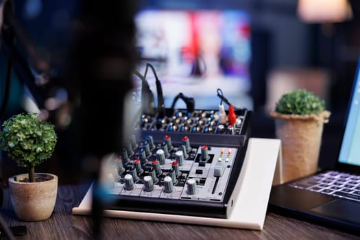 Professional audio mixer on desk at home