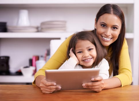 Portrait, kitchen and mother with girl, tablet and bonding together with connection and home. Face, family and mama with daughter and relax with tech and internet with social media and digital app.