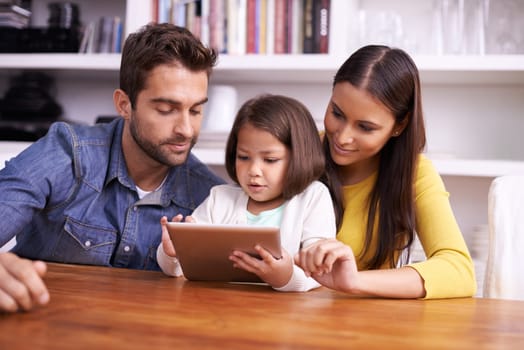 Mother, father and child in home with tablet for teaching, learning or support in kids education with love. Elearning, digital app and parents with girl for help in homeschool, growth and development