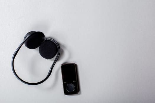 Audio Headphones with Cord on Grey Background