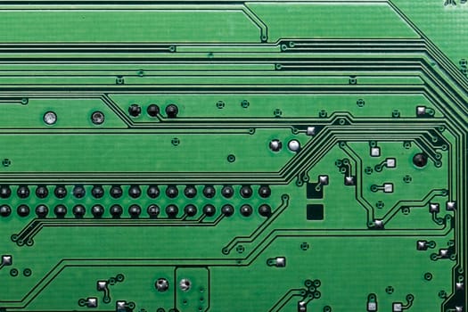 Close up of a printed green computer circuit board