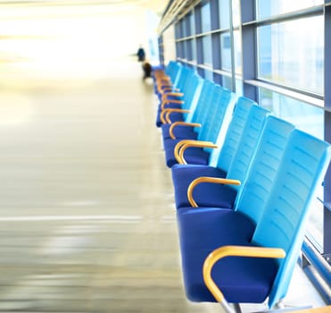 Chair, row and interior in airport for travel, aircraft and flight in building with design in futuristic architecture. Modern, urban and editorial with walls for movement, destination and travelers