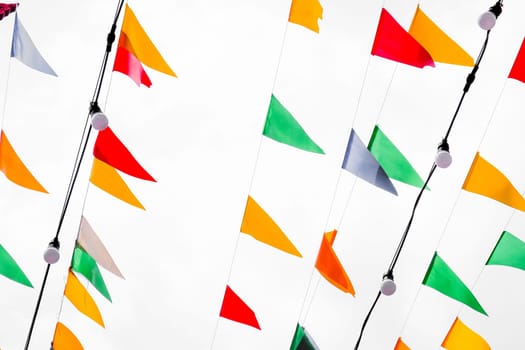 Colorful Hanging Flag on on a string on a white background