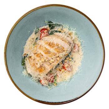 Chicken fillet with parmesan cheese and vegetables
