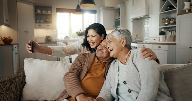 Selfie, living room and woman with senior parents bonding together on a sofa for relaxing at home. Happy, smile and female person taking a picture with elderly people in retirement in the lounge.