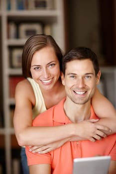 Couple, portrait and happy in home with tablet for streaming online for movies or films, videos and social media memes. Man, woman and together with hug for bonding or love with affection and support