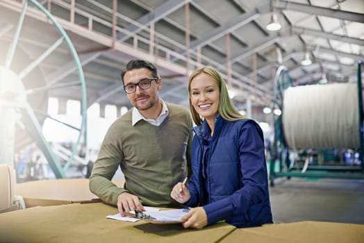 Warehouse, portrait and people with clipboard for package, inventory and boxes for shipping. Colleagues, teamwork and collaboration on import or export, factory and document for logistics on delivery