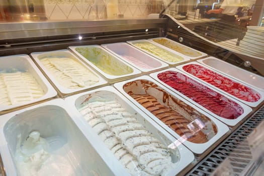 Colorful Assortment of Gelato Flavors in a Display Case at an Italian Ice Cream Shop