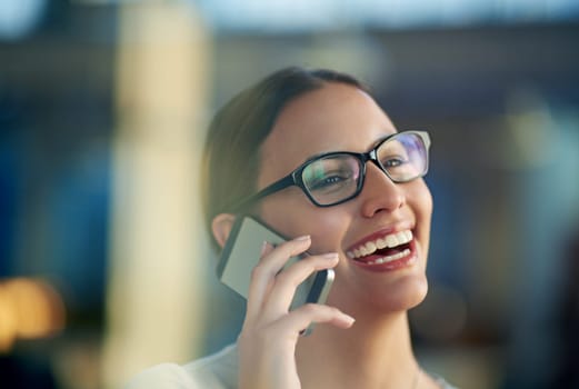 Woman, glasses and phone call at office for business with communication, talking and graphic design. Workplace, agency job and mobile in hand for speaking conversation, internet and creative company