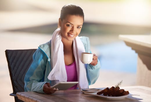 Woman, portrait and coffee with tablet or outdoor after workout with fitness app, breakfast or nutrition. Female person, face and restaurant for exercise snack or digital trainer, wellness or health