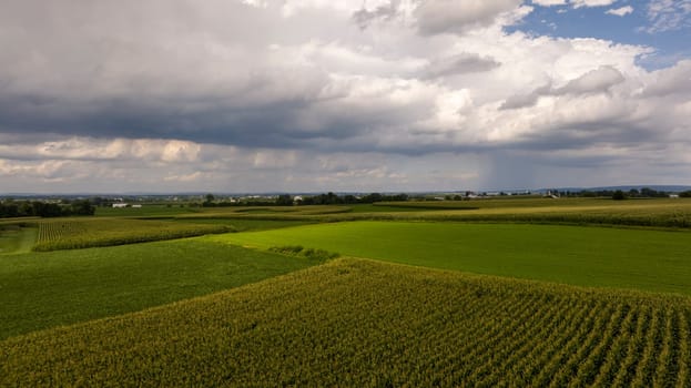 Stormy Skies Over Patchwork Farmlands