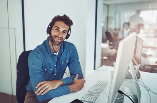 Agent, portrait and computer with headset, smile and office for technical or customer support. Call center man, company and corporate service with workplace, happiness and employee tech confidence