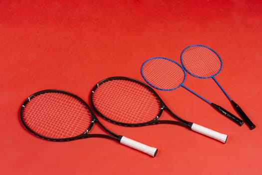 Four rackets. Rackets for tennis and for badminton