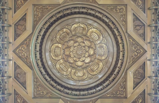 Decorative sculptures on ceiling interior the Buddhism church of Fo Guang Shan Thaihua Temple.