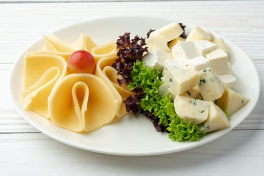 Assortment of cheese on a white plate