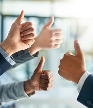 Diversity, emoji and business people with thumbs up in office for collaboration or motivation. Good news, satisfaction and group of lawyers with approval hand gesture for teamwork in workplace.