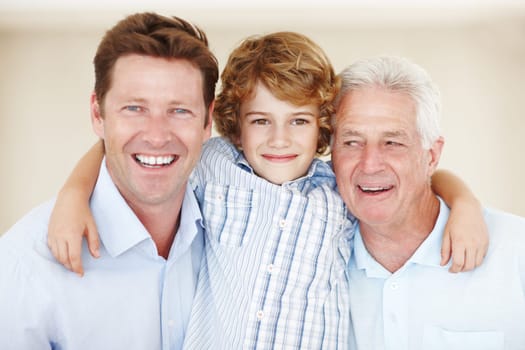 Embrace, father and grandfather or son portrait with smile for bonding, love and relax with generations. Happy family, men and boy child in home for support, care and hugging with confidence or pride