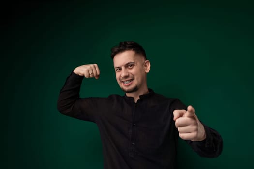 Man in Black Shirt Giving Thumbs Up