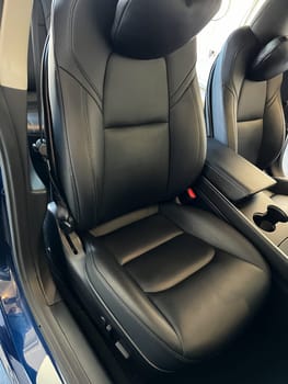 Detailed Interior Cleaning of a Tesla Model 3 in a Home Garage