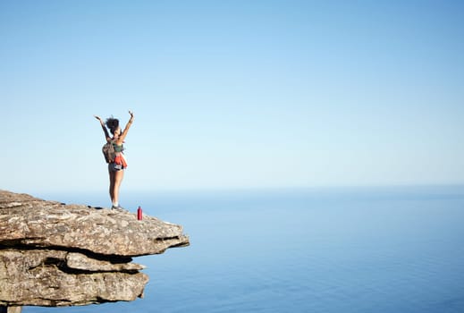 Woman, success and open arms on mountain cliff for freedom, achievement and explore in nature. Hiking, exercise and wellness with ocean, view and cardio for female hiker in for adventure on mockup