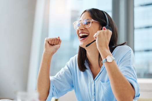 Good news, success or happy woman in call center winning telemarketing or telecom bonus in office. Consultant, agent or excited virtual assistant in celebration of victory, goals or sales achievement.