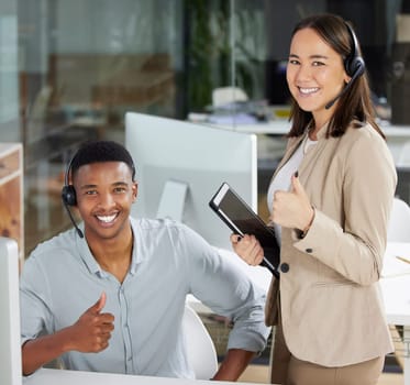 Customer support, thumbs up and portrait of people with tablet for help, call center and success. Communication, telemarketing office and man and woman for contact, crm support and online consulting