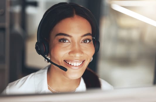 Woman, portrait and headset at call center for telemarketing, customer service or sales. Female person, computer and tech support in workplace or hello advisor for hotline, connection or consultation