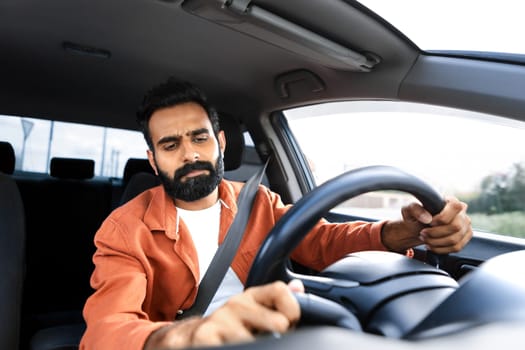 Displeased Middle Eastern Driver Man Driving Having Issue With Automobile