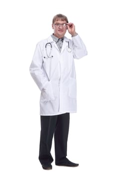 experienced male doctor with a stethoscope. isolated on a white background.