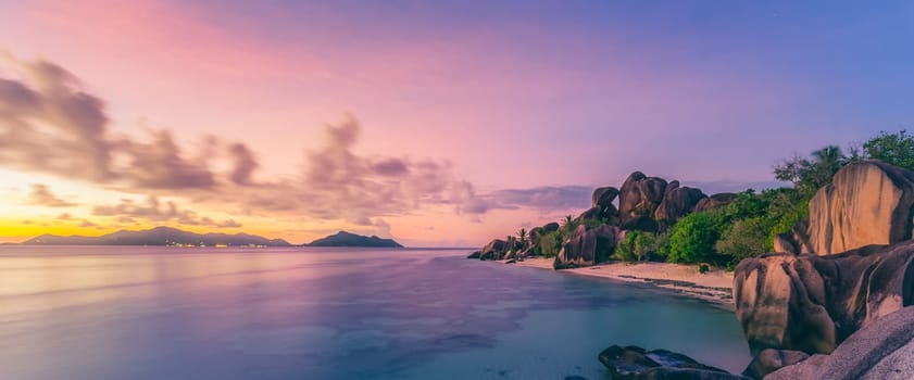 Dramatic sunset at Anse Source d'Argent beach, La Digue island, Seychelles