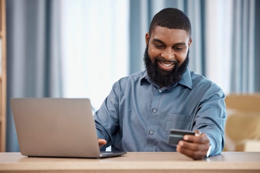 Business man, credit card and laptop for office online shopping, e commerce payment and happy loan. African employee on computer for web banking, financial investment or registration for debit order